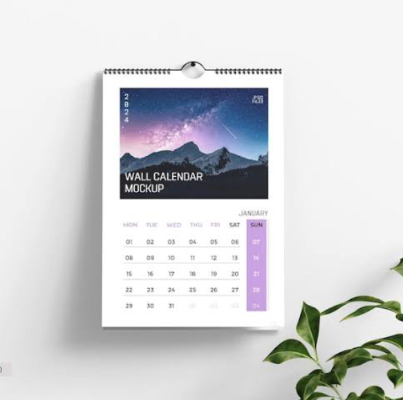 Spiral-bound wall calendar mockup with a starry mountain landscape photo and a January date grid